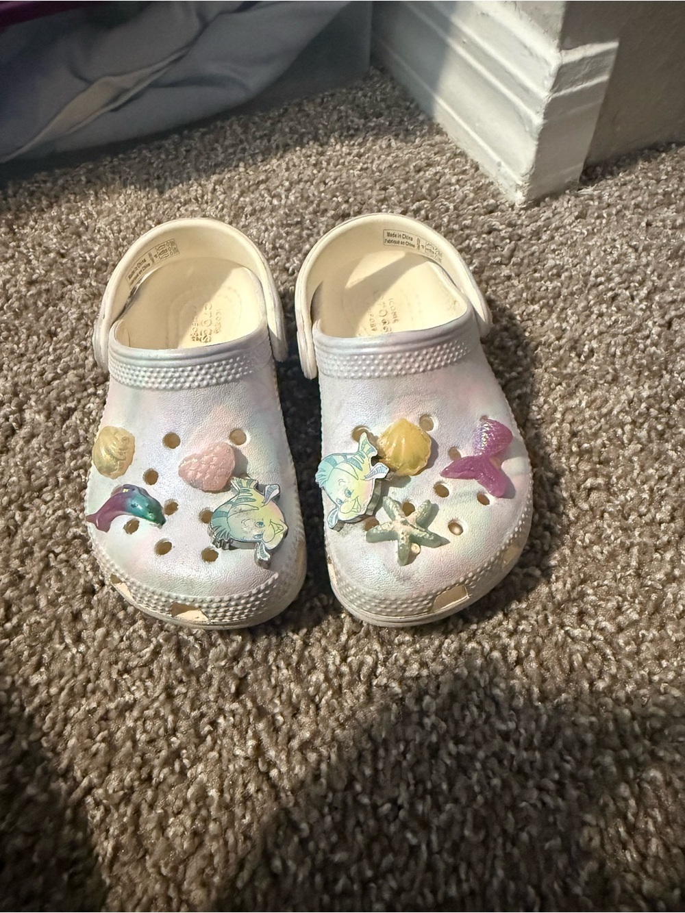CROCS Kids Iridescent White Clogs with Sea Charms